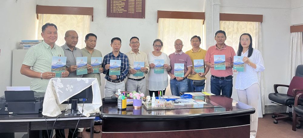 SK Hekshe, Director, Soil &Water Conservation releasing the book ‘Soil and Weather.’